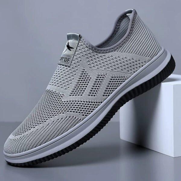 Slip-on fly knit mesh sneakers for men. Hollow breathable upper, easy slip-on design without laces. Lightweight cushioned non-slip sole, great for daily walking, commute and casual wear.