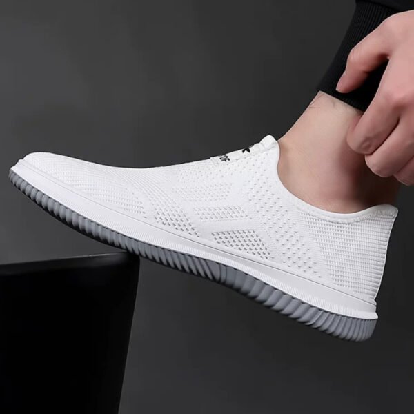 Slip-on fly knit mesh sneakers for men. Hollow breathable upper, easy slip-on design without laces. Lightweight cushioned non-slip sole, great for daily walking, commute and casual wear.