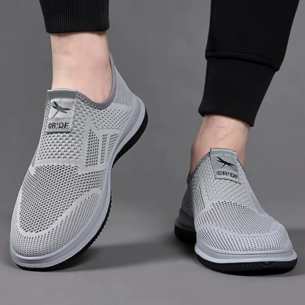 Slip-on fly knit mesh sneakers for men. Hollow breathable upper, easy slip-on design without laces. Lightweight cushioned non-slip sole, great for daily walking, commute and casual wear.