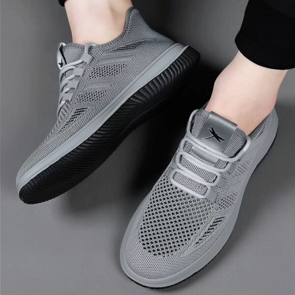 Lightweight hollow fly knit mesh upper delivers superior breathability. Elastic no-tie shoelaces for easy slip-on. Non-slip cushioned rubber outsole, ideal for daily commute, walking and casual outdoor activities.